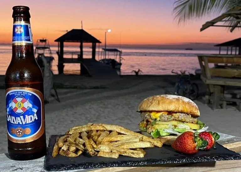The Deco Stop Bar & Grill beachfront on the sand in West End, Roatán